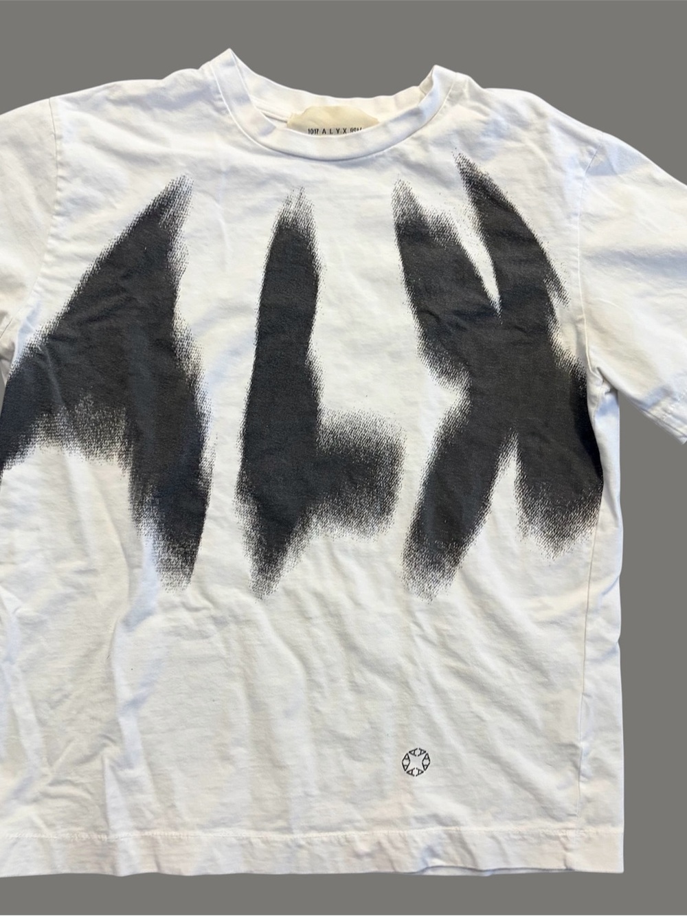 1017 ALYX 9SM White Short Sleeve Tee with Black Brushstroke Graphic